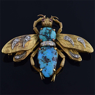 Screen-used Moneypenny brooch on auction