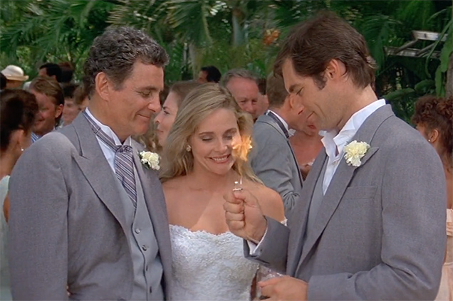 photo © Eon Productions, United Artists, MGM, United International Pictures Felix Leiter and his wife Della give James Bond a Dunhill Lighter with inscription.