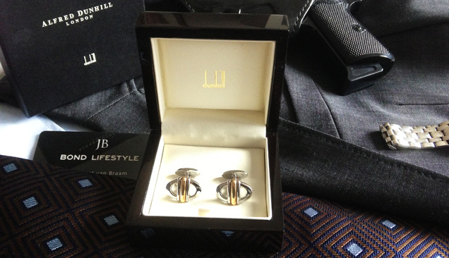 photo © Bond Lifestyle Bond wears Alfred Dunhill cufflinks in Tomorrow Never Dies