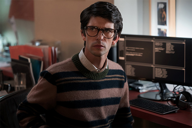 photo © Danjaq LLC, MGM, United Artists Q wears a Marni Pink and Navy Striped Sweater in No Time To Die.