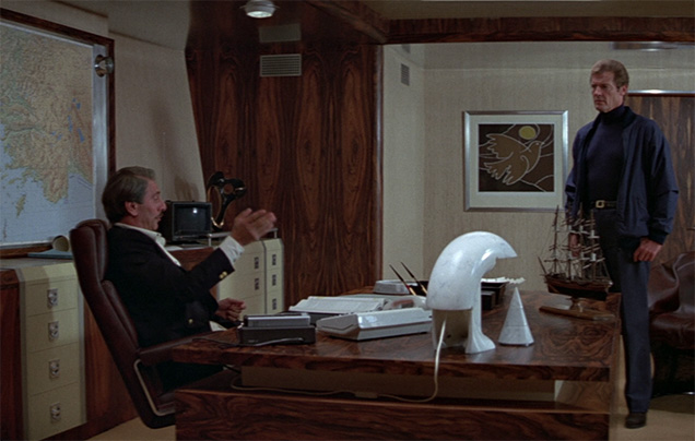 photo © Danjaq, United Artists A Flos Biagio designer lamp can be seen on the desk of Milos Columbo (Chaim Topol) in For Your Eyes Only.