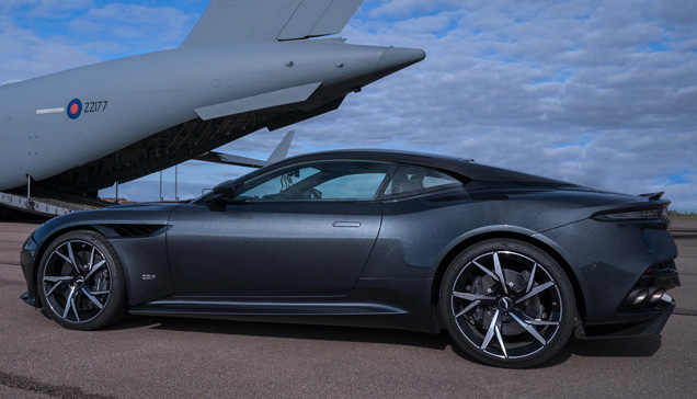 photo © Danjaq LLC, MGM The Aston Martin DBS Superleggera from the movie next to the Boeing C-17 Globemaster.