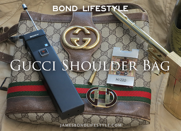photo © Bond Lifestyle Vintage Gucci Bag, similar to the one used in The Man With The Golden Gun, and other items seen in the film: a Sony walkie talkie, Gucci belt buckle, Solex Agitator, Golden Gun, Dom Pérignon Champagne.