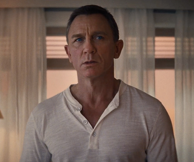 photo © Universal, MGM, Eon Productions, Danjaq Daniel Craig as James Bond wearing a Rag & Bone Henley shirt in No Time To Die