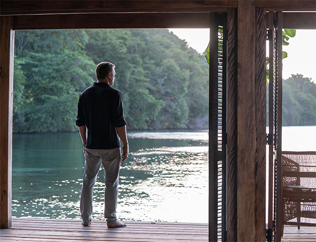photo © Eon Productions, Danjaq, United Artists, Universal Pictures, MGM James Bond in his Jamaican home. One of the official No Time To Die photos released by Entertainment Weekly.