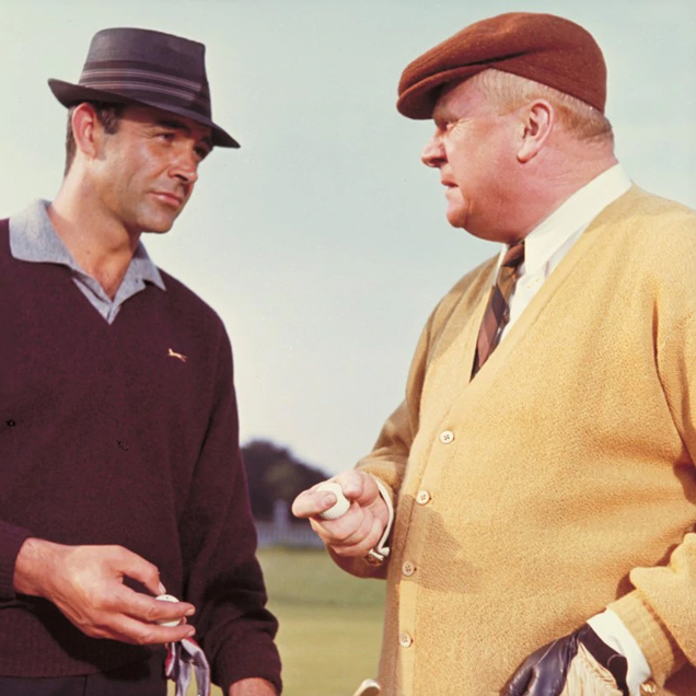 photo © Danjaq LLC, United Artists James Bond and Auric Goldfinger during the golf match in Goldfinger.