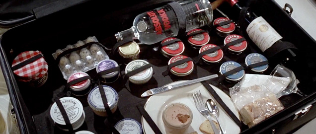 photo © Columbia-EMI-Warner The suitcase full of caviar, quail eggs, Gentleman's Relish, foie gras, vodka and wine
