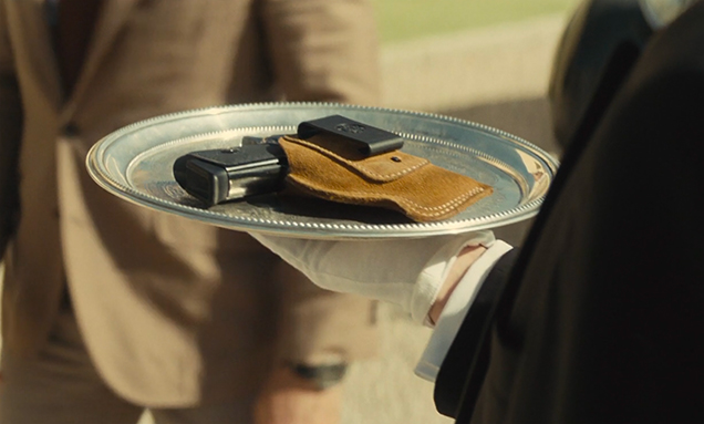 photo © Danjaq LLC, MGM, United Artists Great close up of the Vega holster in SPECTRE, when Bond has to hand in his Walther PPK before entering Blofeld's compound.