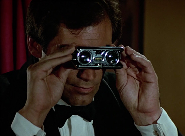 photo © Danjaq LLC, MGM, United Artists Timothy Dalton as James Bond uses Tasco Folding Opera Binoculars in The Living Daylights. He holds them upside down.