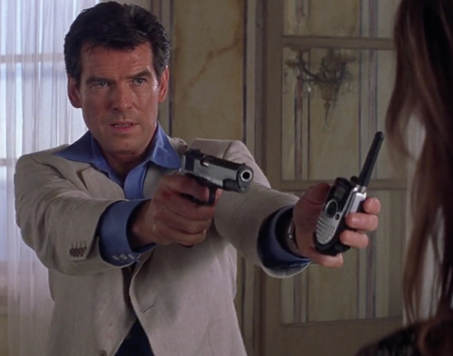 photo © Danjaq LLC, MGM, United Artists Pierce Brosnan as James Bond hands the Motorola TalkAbout TA280 SLK Two-Way Radio to Elektra King (Sophie Marceau)