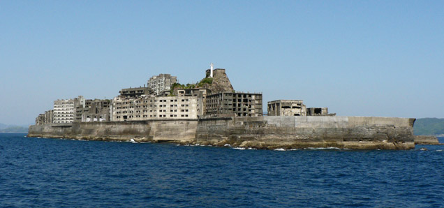 photo © Hisagi Hashima Island, commonly called Gunkanjima (meaning Battleship Island), is one among 505 uninhabited islands in the Nagasaki Prefecture about 15 kilometers (9 miles) from Nagasaki itself.