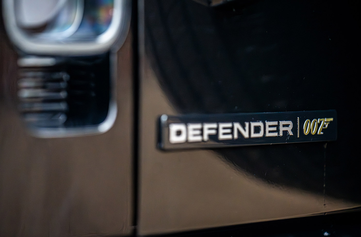 Land Rover Defender 110 James Bond Edition comes to auction plaque