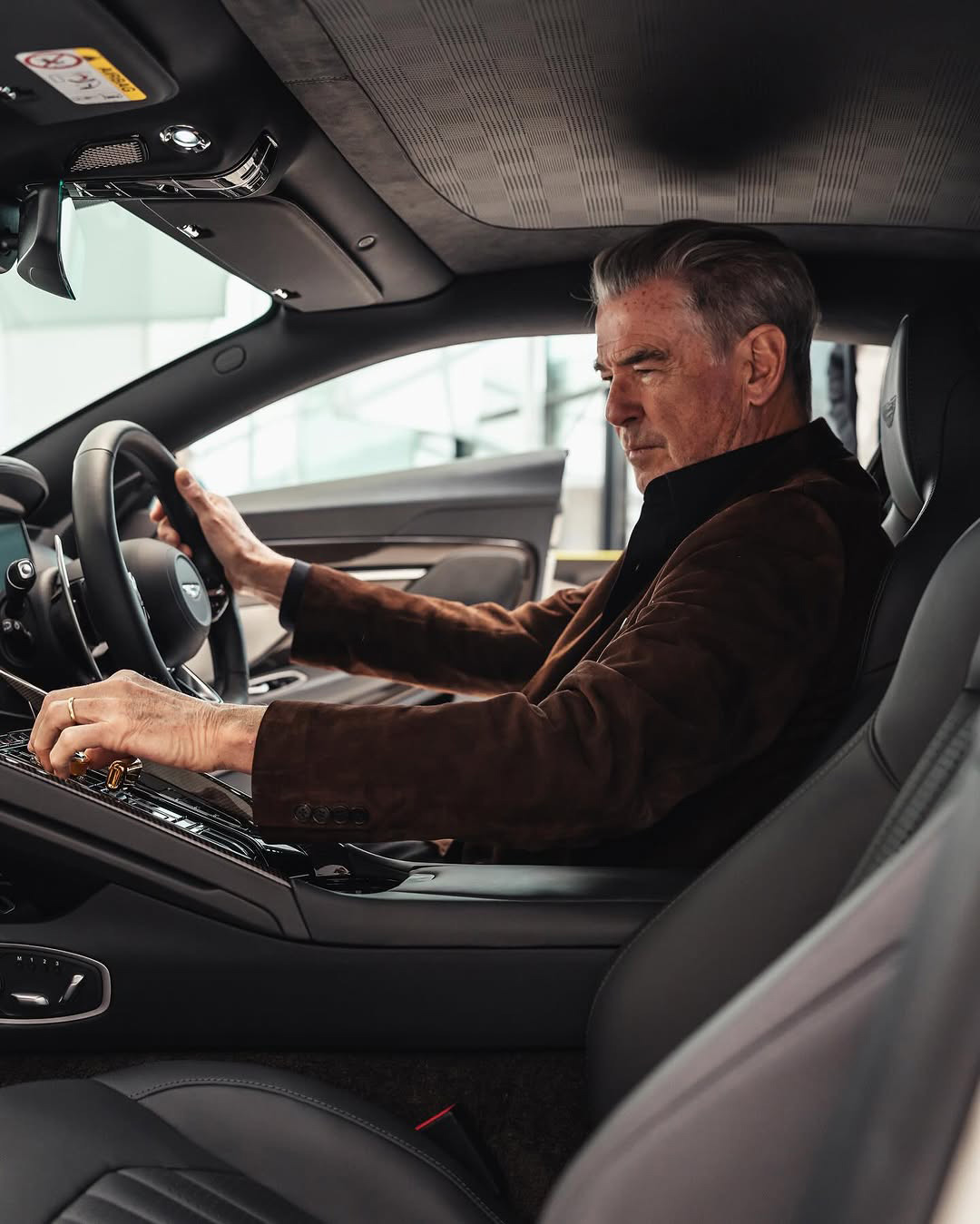 Pierce Brosnan and the Aston Martin Vanquish at Gaydon HQ 3